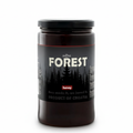 Jar of honey labeled 'Forest' on a white background